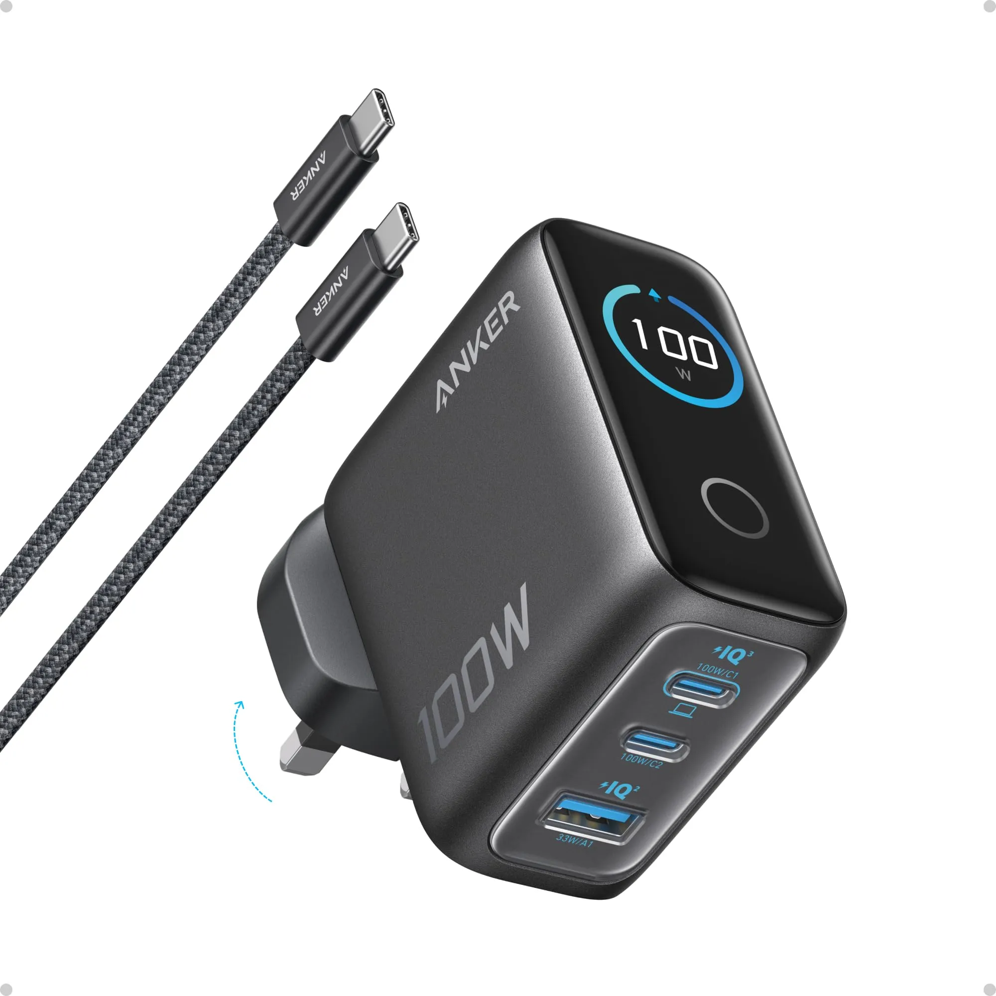 Anker 100 W charger in black with a round display reading 100 W, two USB-C ports and one USB-A port, folding UK pins and a braided USB-C cable