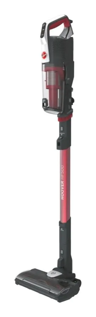 Hoover HF500 cordless stick vacuum in red and grey, upright with a clear bin behind the handle and a motorised floor head