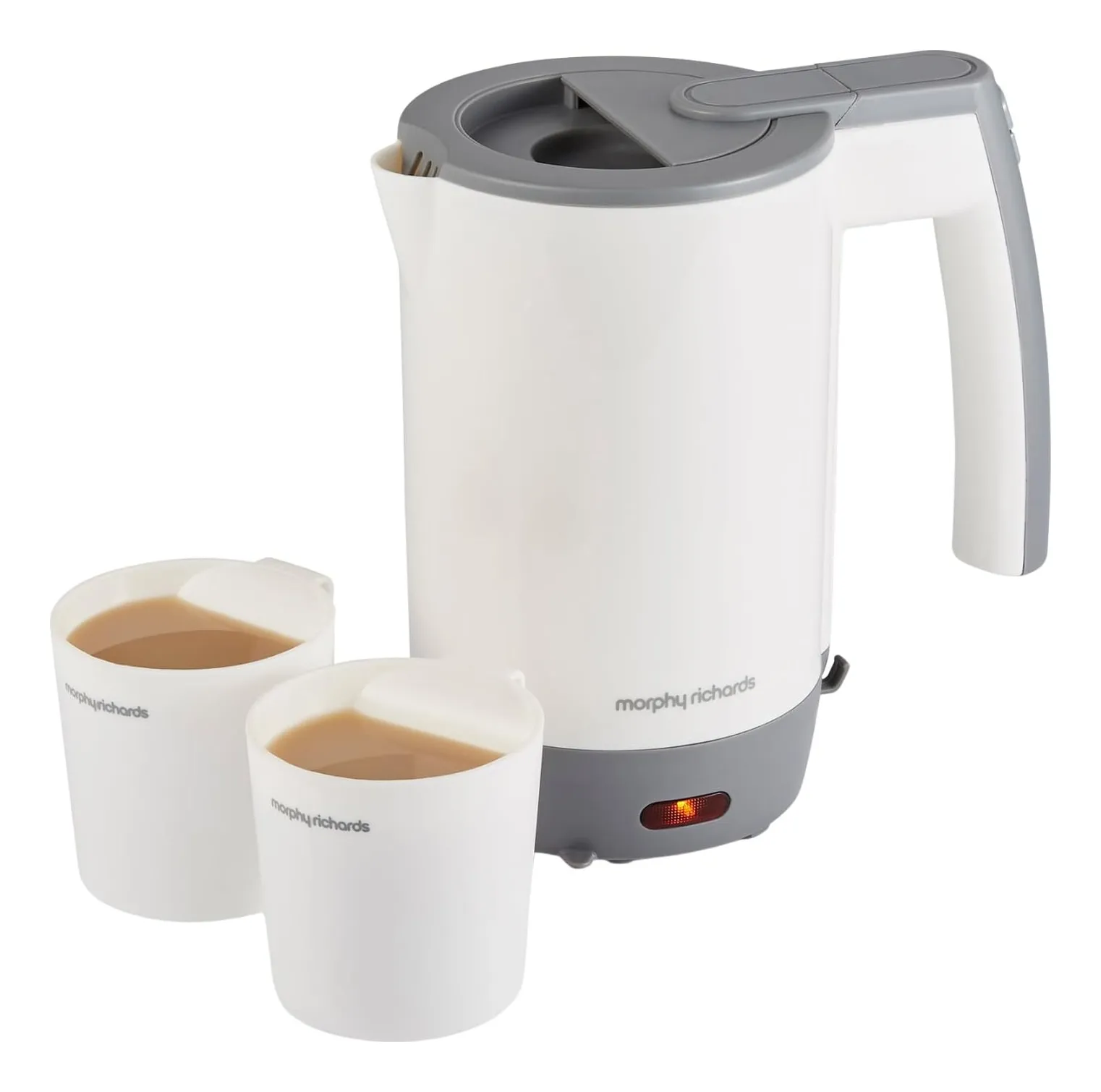 Morphy Richards 0.5-litre travel kettle in white and grey with a hinged lid and two matching cups of tea beside it