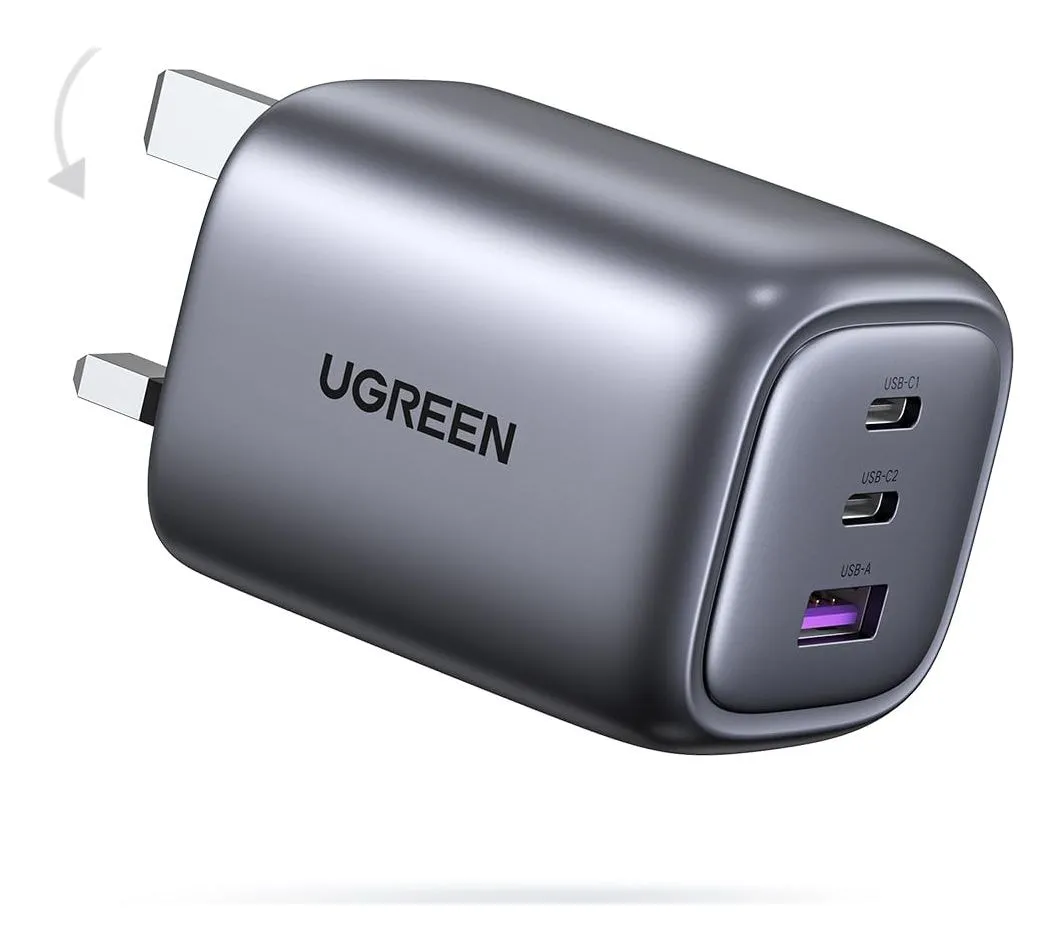 UGREEN Nexode 65 W charger in grey with two USB-C ports and one USB-A port on the face and a folding UK plug
